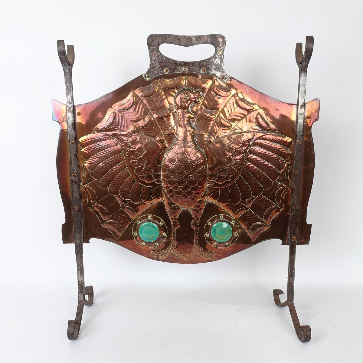 An Arts & Crafts fire screen